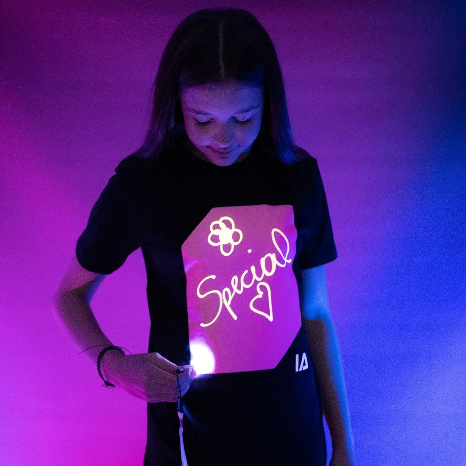 Illuminated Apparel Original Interactive Glow in The Dark T-Shirt - Fun for Birthday Parties & Festivals