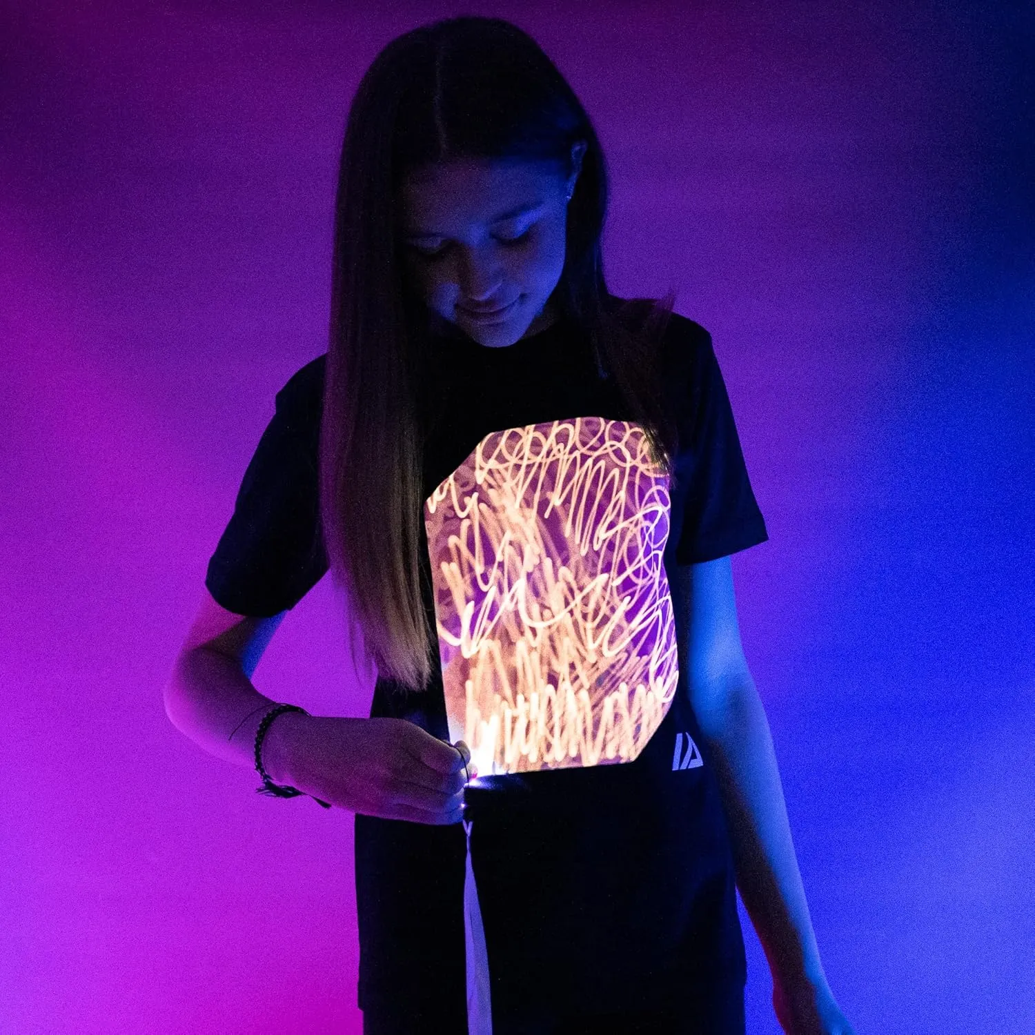 Illuminated Apparel Original Interactive Glow in The Dark T-Shirt - Fun for Birthday Parties & Festivals