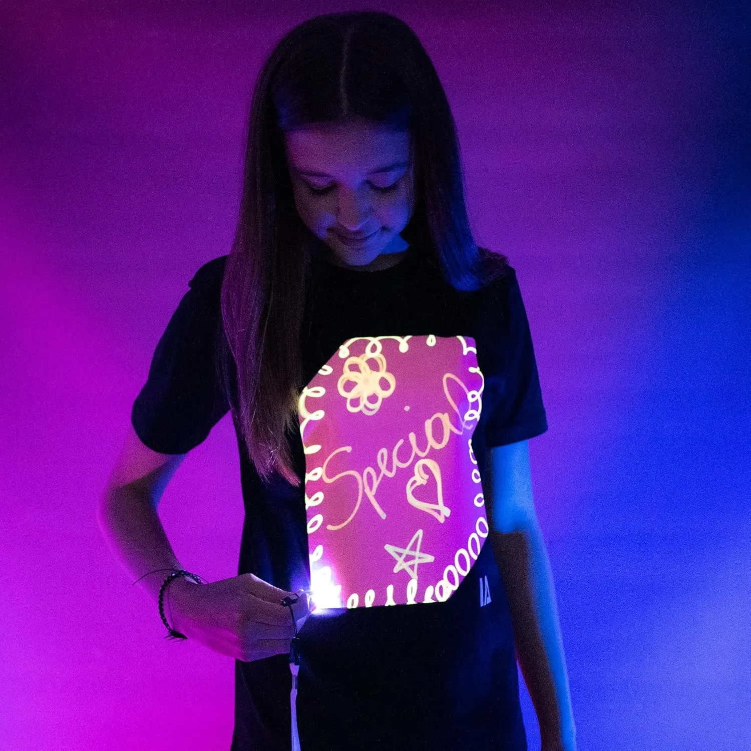 Illuminated Apparel Original Interactive Glow in The Dark T-Shirt - Fun for Birthday Parties & Festivals