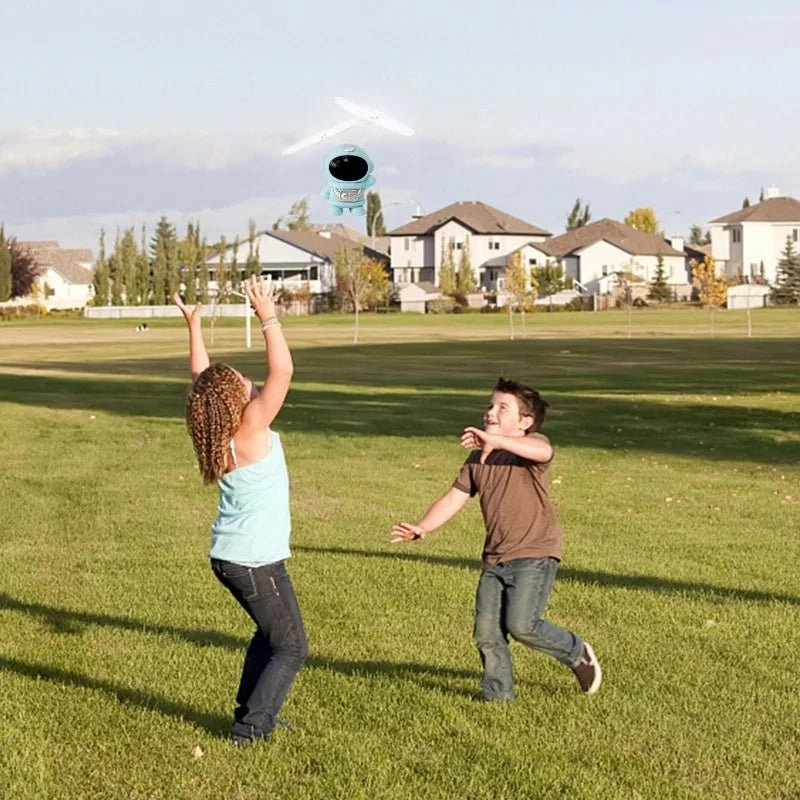 Interactive Flying Mini Astronaut Drone – Hand-Controlled Robot Toy with Lights, Perfect Outdoor Fun Gift for Kids